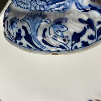 A Dutch Delft blue and white butter tub in the shape of a mermaid, 18th C.